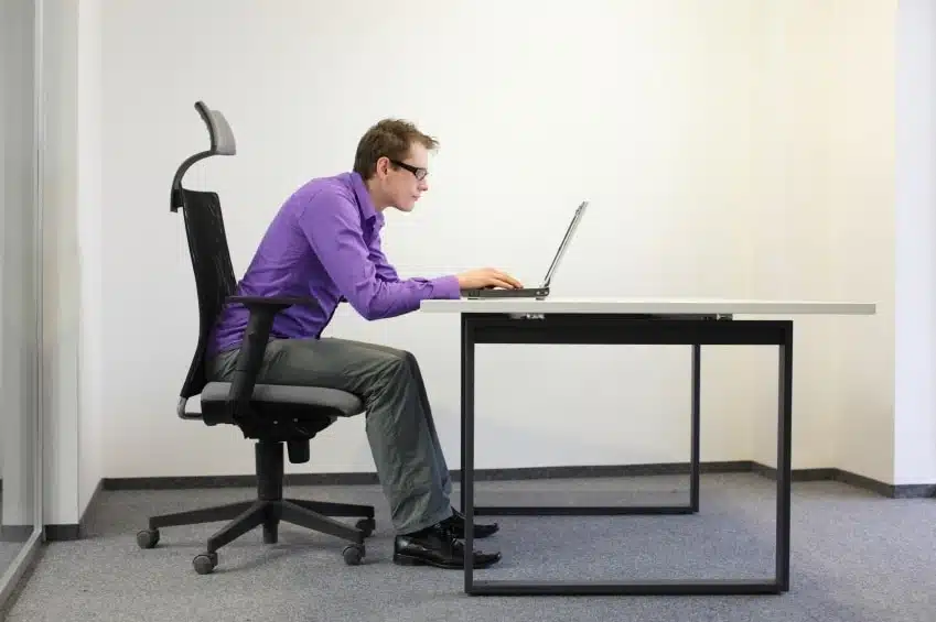 Soft geometric overlay above office desk items
